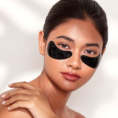 111SKIN Black Diamond Eye Mask in use under eye for soothing routine
