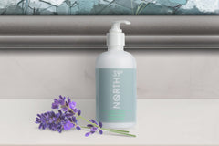 39° North conditioner packaging on hotel-style shelf signals premium quality.