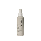Acure Bonding Leave-In Conditioner bottle pour illustrating lightweight hydration and protection.