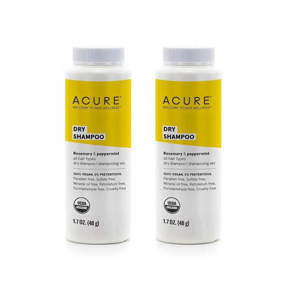 Acure dry shampoo powder applying for instant volume and refreshed roots