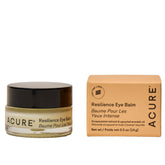 Acure Resilience Eye Balm jar closeup shows creamy texture for gentle application.