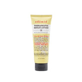 Adamia Therapeutic Repair Lotion tube front highlights fragrance-free, non-greasy hydration for dry skin.