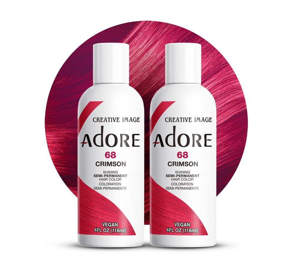 Adore Crimson hair color bottle close-up showcases vibrant pigment for bold red results.