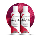 Adore Crimson hair color bottle close-up showcases vibrant pigment for bold red results.