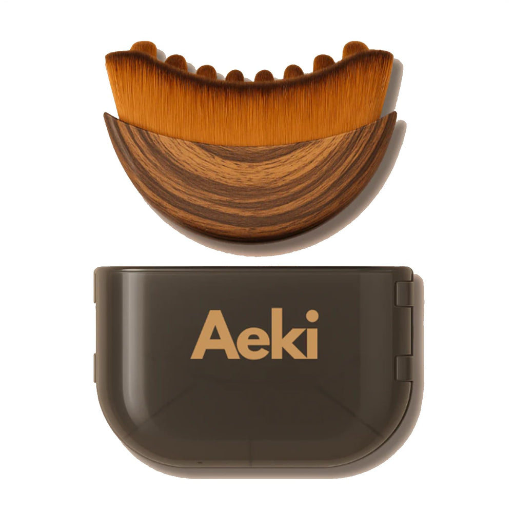 Aeki Brush lymphatic massage closeup showing gentle movement that may reduce puffiness.