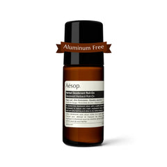 Aesop Herbal Deodorant Roll-On bottle close-up highlighting sage-leaf aroma.