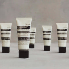 Aesop Purifying Facial Exfoliant Paste rosemary leaf close-up highlights botanicals for cleansing