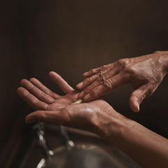 Aesop Rejuvenate Balm texture swirl, creamy and luxurious for dry skin.
