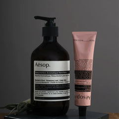 Aesop Resurrection Aromatique Hand Balm dispense demonstrates easy application