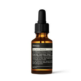 Aesop Shine Hair Oil bottle provides silicone-free hydration for smooth, lustrous hair.