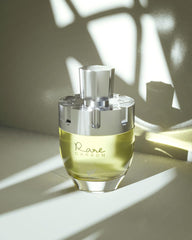 Afnan Rare Carbon bottle wood-tone finish evokes masculine elegance and longevity.