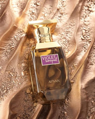 Afnan Violet Bouquet bottle on a mirror highlighting radiant evening allure.