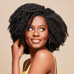 African Pride Moisture Miracle Curling Cream braid-outs deliver defined, moisturized coils