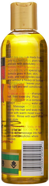 African Royale Hot Six Oil bottle being poured for scalp hydration and salon-grade shine.