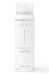 AIIR Texture Spray bottle front view shows compact 2.4 oz packaging for portable styling.