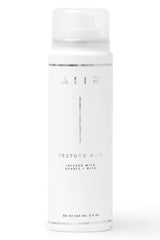 AIIR Texture Spray bottle front view shows compact 2.4 oz packaging for portable styling.