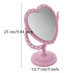 AKOAK heart-shaped mirror rotated to show 360-degree rotation and tilt for different looks.