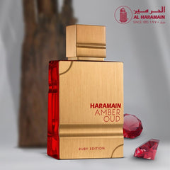 Amber Oud Ruby Edition base notes ambergris wood musk warm finish