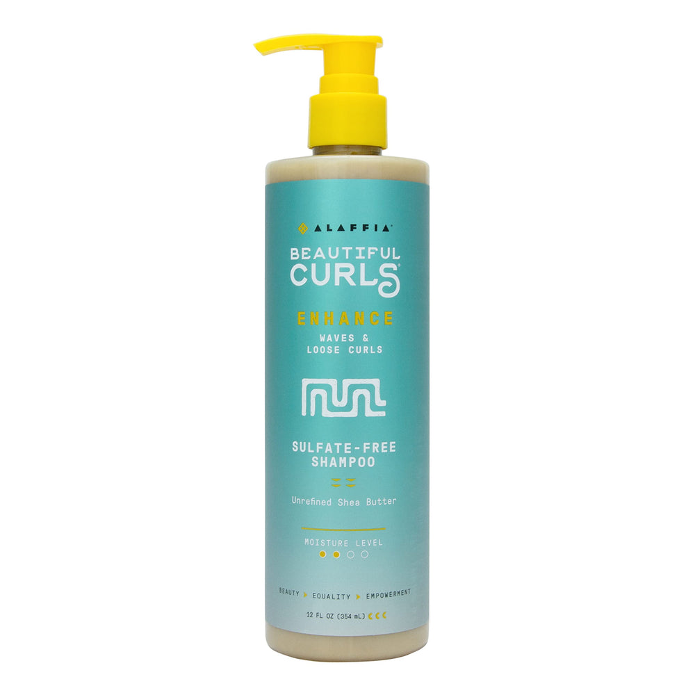 Alaffia Beautiful Curls shampoo bottle pouring rich moisture for curls.