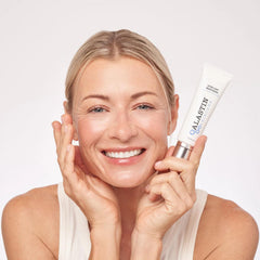 Close-up of ALASTIN Ultra Light Daily Face Moisturizer bottle cap, emphasizing non-greasy hydration