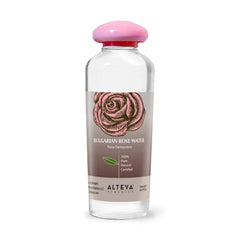 Alteya Rose Water bottle closeup, pure Rosa Damascena for facial toning.