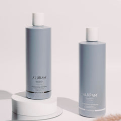 ALURAM Coconut Water Moisturizing Shampoo lather closeup highlights creamy cleansing for gentle use.