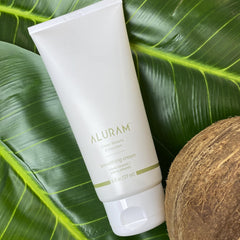ALURAM Coconut Water Smoothing Cream application on hair shows easy smoothing and tangle-free styling.