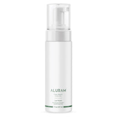 ALURAM Curl Foam bottle side view highlighting lightweight, defining formula for curls