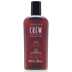 American Crew 3-in-1 bottle pouring, showcasing convenient all-in-one cleansing for hair and skin.