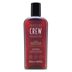 American Crew conditioner bottle pour with Citrus Mint fragrance for daily hydration.