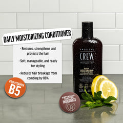 American Crew conditioner being applied to hair for detangling and moisture.