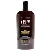 AMERICAN CREW Daily Conditioner bottle detangles hair with lightweight moisture.