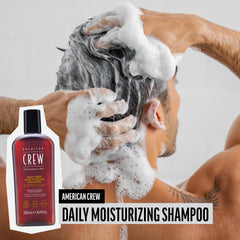 American Crew Deep Moisturizing Shampoo lather close-up showing rich conditioning.