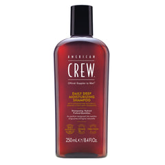 American Crew Shampoo bottle showing daily deep moisturizing formula for soft, hydrated hair.