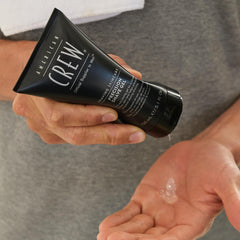 American Crew Shave Gel application on beard demonstrates close, controlled shaving.