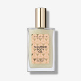 Anastasia Beverly Hills Shimmer Body Oil Gold bottle close-up showing pearlescent glow