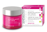 Andalou Naturals 1000 Roses Day Cream jar closeup showing silky texture for smoother skin.
