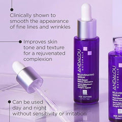 Andalou Naturals Age Defying serum ingredients bowl showcasing nature-derived, non-GMO formulation.