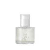 ANILLO Gardenia Veil bottle closeup demonstrates a lightweight leave-in for color-treated hair protection.