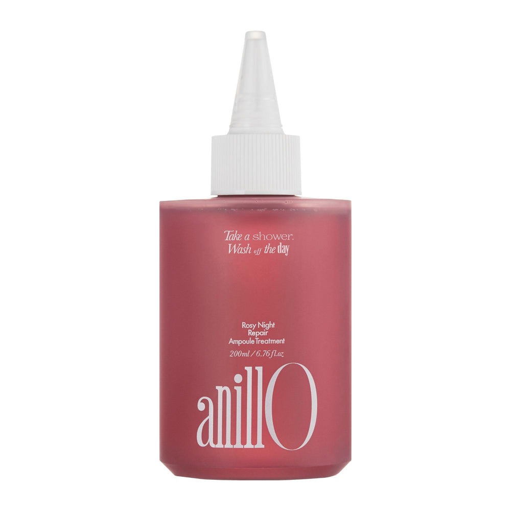 ANILLO Rosy Night Ampoule bottle on vanity, highlighting frizz control and color-safe care.