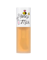 A'PIEU Honey & Milk Lip Oil bottle close-up delivering long-lasting moisture.