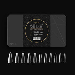 APRÉS Gel-X Sculpted Stiletto tips in open box display size variety.