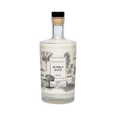 Archipelago Botanicals Luxury Milk Bubble Bath bottle pour shows hydrating bubbles for a calming soak