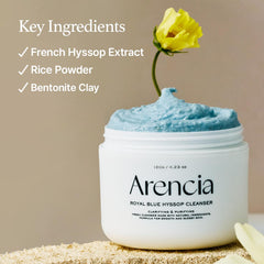 ARENCIA Hyssop Brightening Scrub applied to skin for gentle cleansing in motion.
