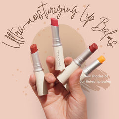 Argan oil rich balm texture on finger conveys nourishing, silky lip feel.