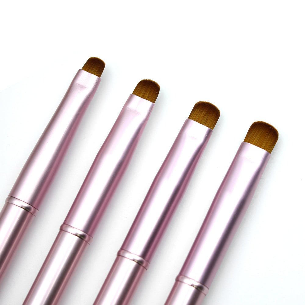 Aridito pink metal nail brush with a secure handle for precise cleanup around French tips.
