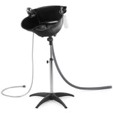Artist hand Shampoo Bowl adjustable-height design for comfortable client washing.