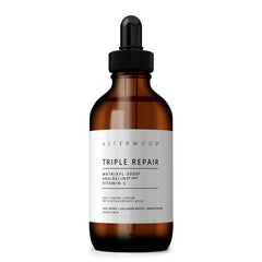Asterwood Triple Repair Serum bottle front view highlighting fragrance-free, hydrating formula for daily use.