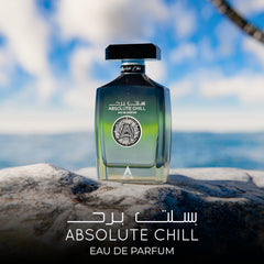 Atralia Absolute Chill close-up bottle, orange and green lemon zest for vibrant freshness.