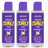 Aussie Miracle Curls Defining Oil bottle closeup showing hydration and shine for curly hair.